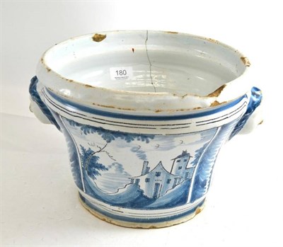 Lot 180 - Early 19th century tin glaze jardiniere with mask handles