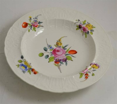 Lot 182 - A 19th century English/Welsh porcelain soup bowl, with relief moulded decorated and painted...