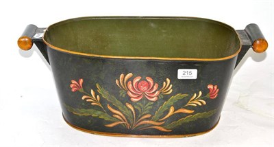 Lot 215 - A Tole ware planter painted with flowers