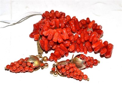 Lot 308 - A pair of coral earrings in grape form, another and a coral necklace