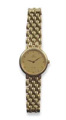 Lot 299 - A Lady's 18ct Gold Wristwatch, signed Omega, De Ville, circa 1995, quartz movement, gilt dial...