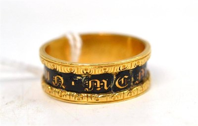 Lot 330 - An 18ct gold mourning ring, enamelled in black engraved to the inner shank `In the memory of...