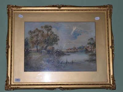 Lot 397 - Henry James Kinnaird (fl.1880-1908), figures collecting hay beside a river, signed watercolour