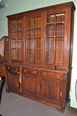 Lot 418 - Oak Gothic revival bookcase with linen fold panels