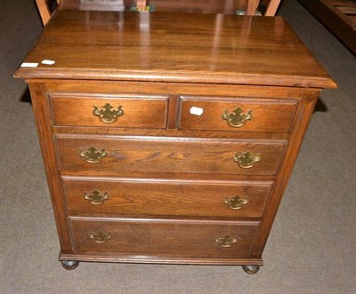 Lot 433 - Reproduction oak chest in George III style