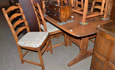 Lot 435 - Reproduction dining table and six chairs and a sideboard