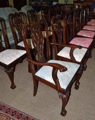 Lot 469 - A set of twelve (10 + 2) 20th century mahogany dining chairs Chippendale style, with carved...