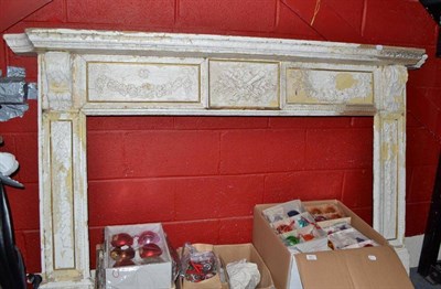 Lot 562 - Georgian pine fire surround decorated with stucco