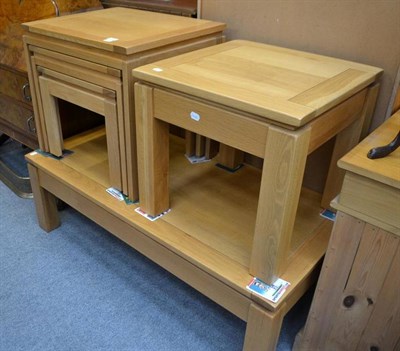 Lot 581 - A modern ash nest of three tables, coffee table and side table