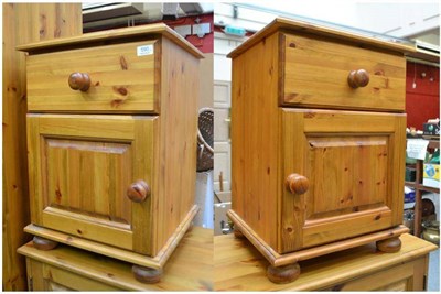 Lot 590 - A pair of modern pine bedside tables