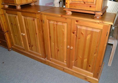 Lot 591 - A pair of modern pine side cupboards