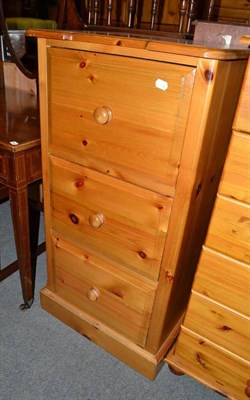 Lot 602 - A modern pine filing cabinet