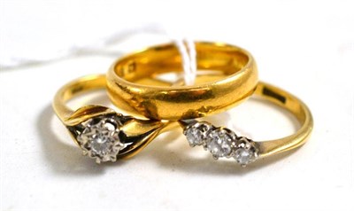 Lot 1 - 22ct gold band ring, three stone diamond ring stamped '18ct' and an 18ct gold diamond ring (3)