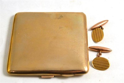 Lot 12 - A 9ct gold cigarette case and a pair of cufflinks