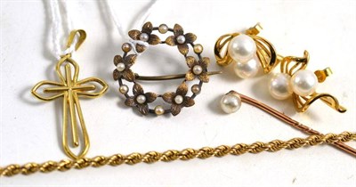 Lot 32 - A pearl set floral brooch stamped '15ct', a pearl set pin, a 9ct gold cross pendant, a 9ct gold...