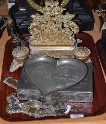 Lot 52 - A late 19th century letter/inkwell stand, ten silver plated spirit labels, locomotive pewter...