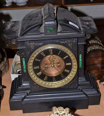 Lot 53 - A black slate striking mantel clock