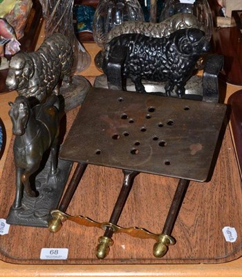 Lot 68 - A Georgian steel and brass adjustable trivet, three door stops in the form of sheep and a...