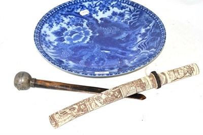 Lot 69 - A Japanese bone dagger, a blue and white dish and a paper knife