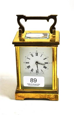 Lot 89 - Brass carriage timepiece by Postillion