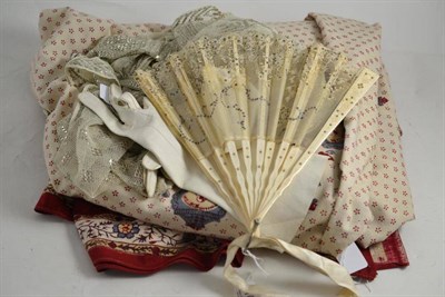 Lot 104 - Assuit shawl, printed bed cover, bone fan with sequin decoration and pair of kid leather gloves (4)