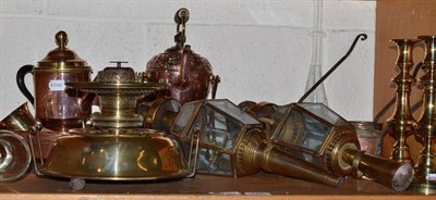 Lot 124 - A shelf of copper and brassware including a pair of coach lamps, spirit kettle, cider warmers,...