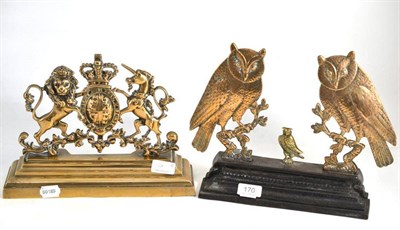Lot 170 - 19th century cast iron doorstop surmounted with three owls and a brass door stop bearing a...