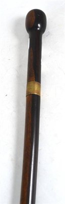 Lot 187 - A rosewood gadget cane, the shaft drilled as a flute, with a silver collar and a base metal...