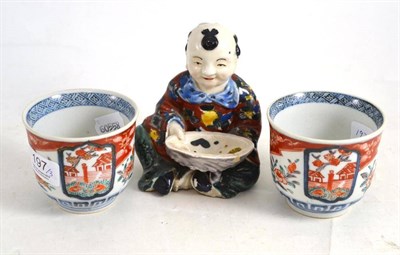 Lot 197 - Pair of Imari beakers and a Japanese figure of a boy