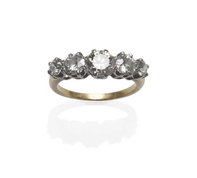 Lot 351 - A Diamond Five Stone Ring, the graduated old cut and round brilliant cut diamonds in white claw...