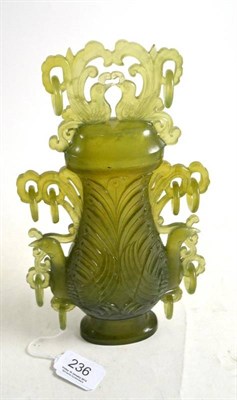Lot 236 - A green glass vase and cover in the Chinese style