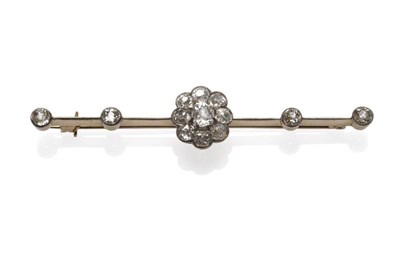 Lot 354 - A Diamond Cluster Bar Brooch, circa 1910, a central cluster of nine old cut diamonds, to arms...