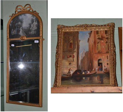 Lot 282 - An Edwardian gilt gesso framed pier glass, the frieze set with a print and an oil on canvas...
