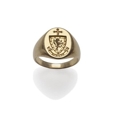 Lot 365 - A Crested Intaglio Ring, signed 'CARTIER', the oval head with crest which depicts a shield...