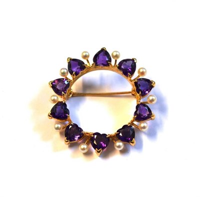 Lot 368 - An Amethyst and Cultured Pearl Hoop Brooch, the heart shaped amethysts in yellow claw settings...