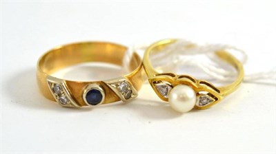 Lot 28 - A cultured pearl and diamond set ring and a sapphire and diamond set ring