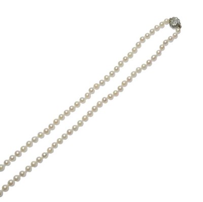 Lot 387 - A Cultured Pearl Necklace with a Diamond Cluster Clasp, ninety-one slightly off-round cultured...