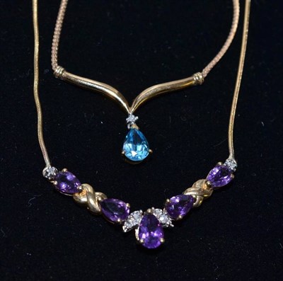 Lot 48 - A 9ct gold amethyst and diamond necklace and a topaz and diamond necklace