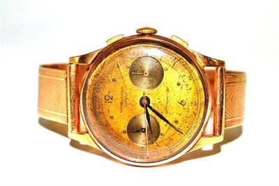 Lot 55 - A gent's chronograph wristwatch with case stamped 18k 0.750,  bracelet stamped 375
