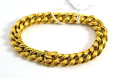 Lot 67 - A double curb link bracelet, stamped '0.750', length 19cm