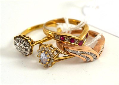 Lot 72 - A diamond cluster ring, stamped '18CT' and three 9ct gold stone set rings