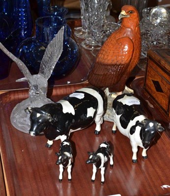 Lot 81 - A Beswick Friesian bull, cow and two calves, a Beswick golden eagle decanter and a glass figure