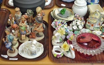 Lot 84 - Two trays of decorative ceramics and glass including ten Hummel figures, flower encrusted...