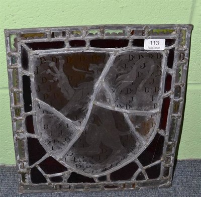 Lot 113 - A leaded and stained glass armorial panel