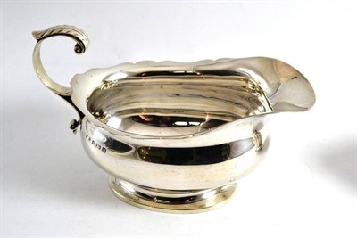 Lot 134 - A solid silver sauceboat