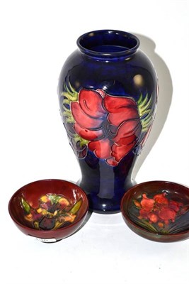 Lot 135 - A Moorcroft vase and two bowls