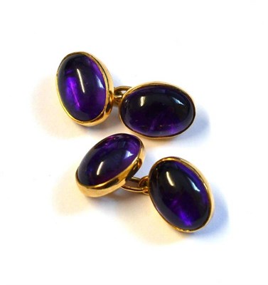 Lot 397 - A Pair of 9 Carat Gold Amethyst Cufflinks, comprising two cabochon amethysts, chain linked, in...