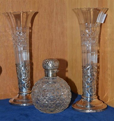 Lot 140 - A pair of silver mounted cut glass vases and a silver mounted cut glass scent bottle