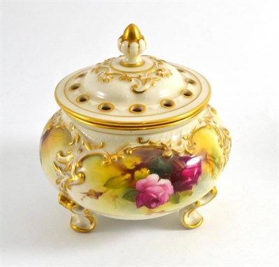 Lot 149 - A Royal Worcester porcelain pot pourri vase and cover painted with roses