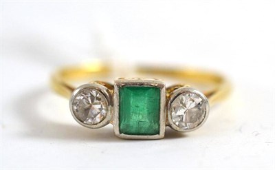 Lot 167 - A diamond and emerald three stone ring
